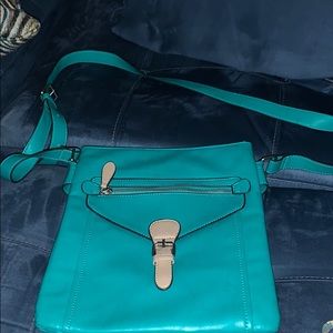 Teal cross body bag.